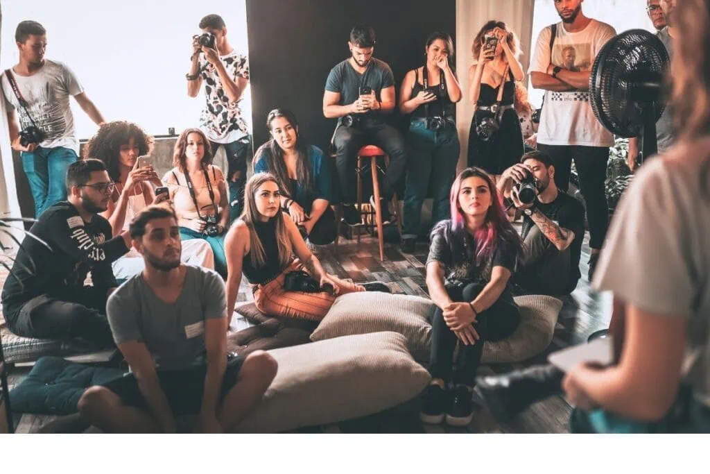 Students gathered watching a speaker in person