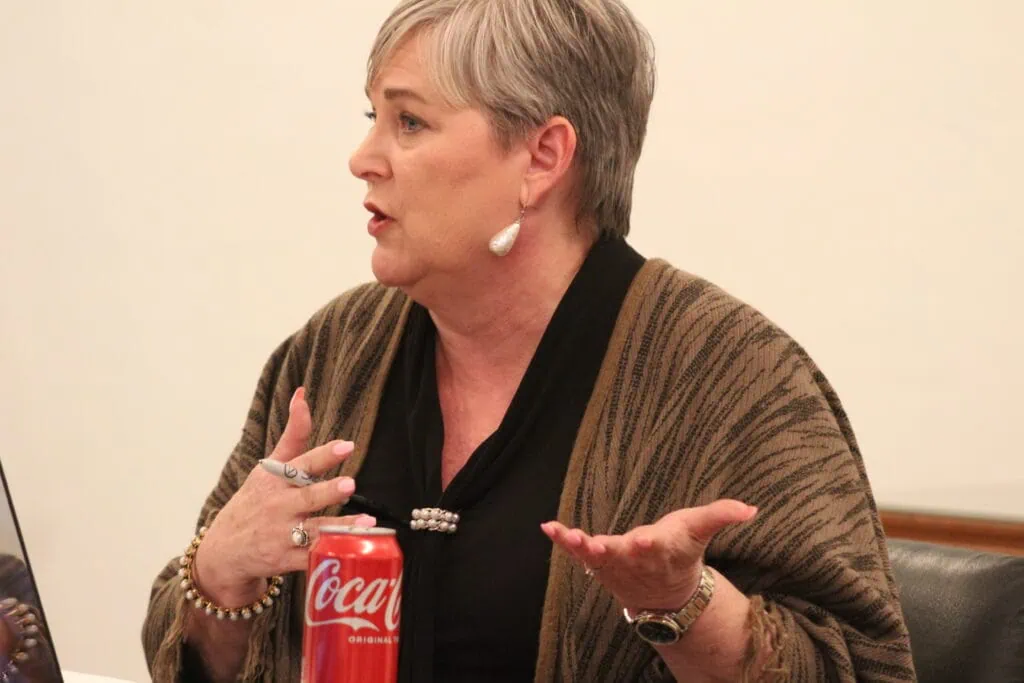 Lacy Roberts speaks to the Newberry Community School Board at a meeting.