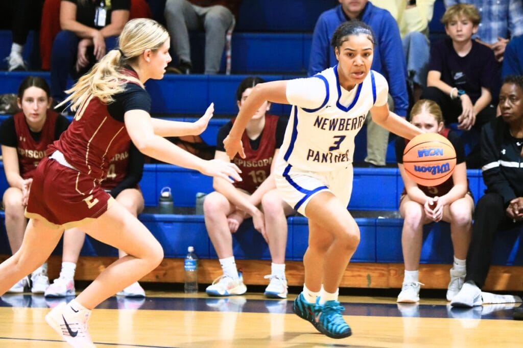 Newberry's Rihanna Chiever (3) dribbles around a defender against Episcopal (Jacksonville) in the Class 3A-Region 1 Quarterfinals. Photo by C.J. Gish