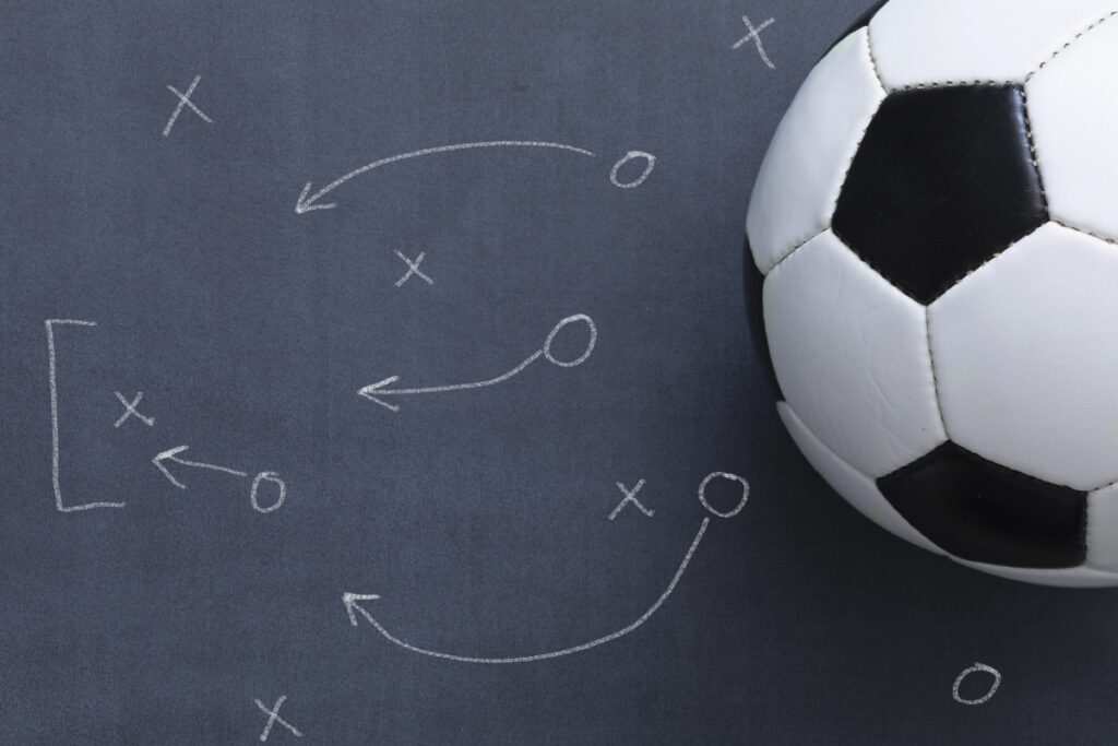 Soccer ball with chalkboard strategy.