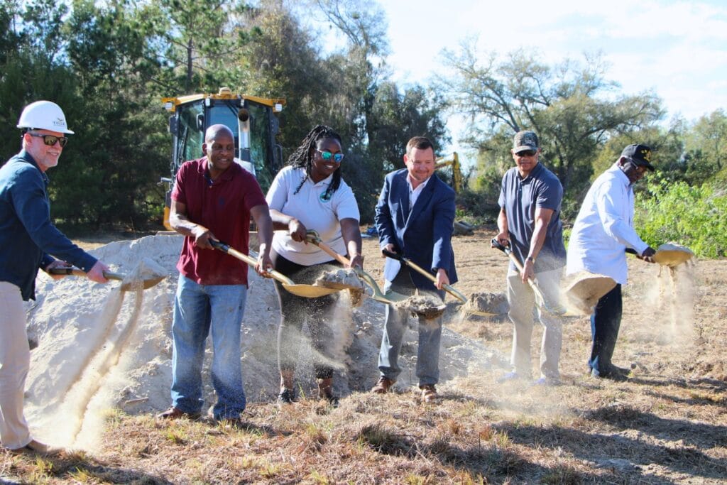 Hawthorne city officials break ground on a 15,000-square-foot resource center with project crews. Photo by Lillian Hamman