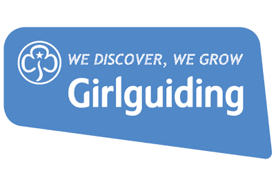 Blue Girlguiding logo with white trefoil symbol and the words 