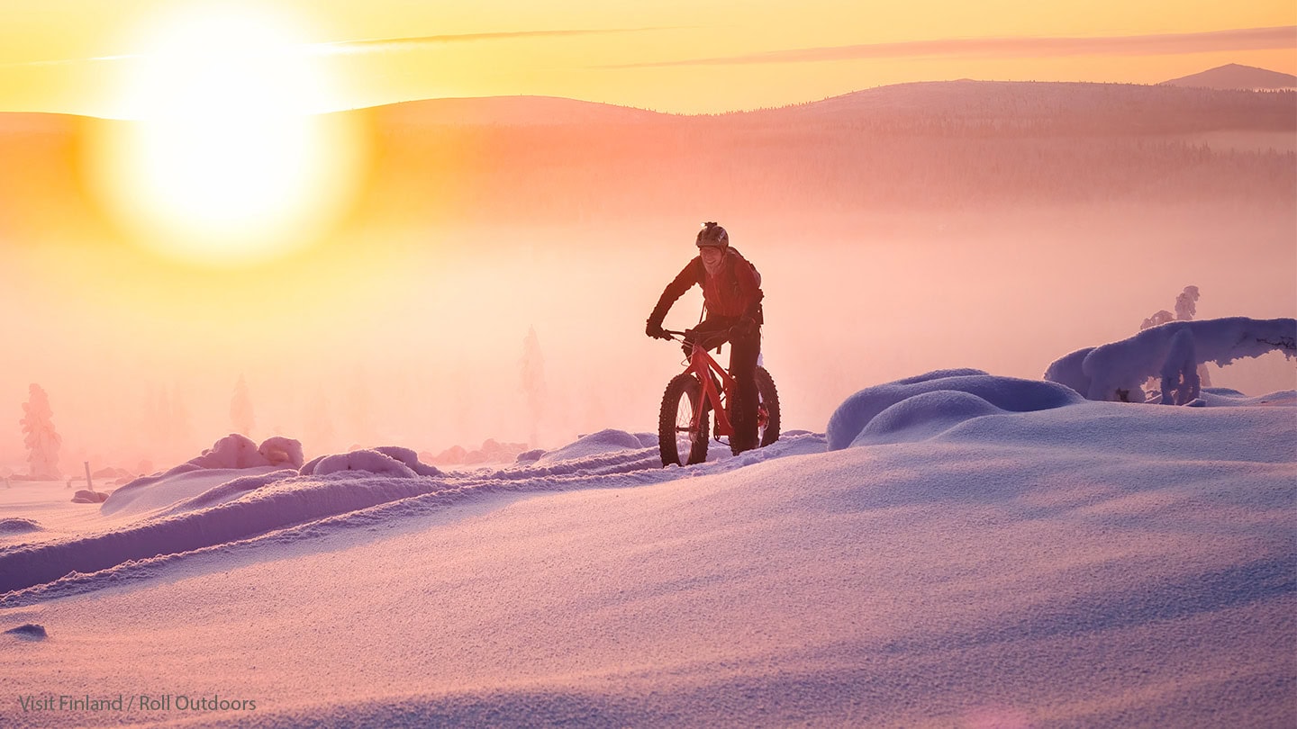 Winter fatbiking in the snow. Image: Visit Finland/Roll Outdoors