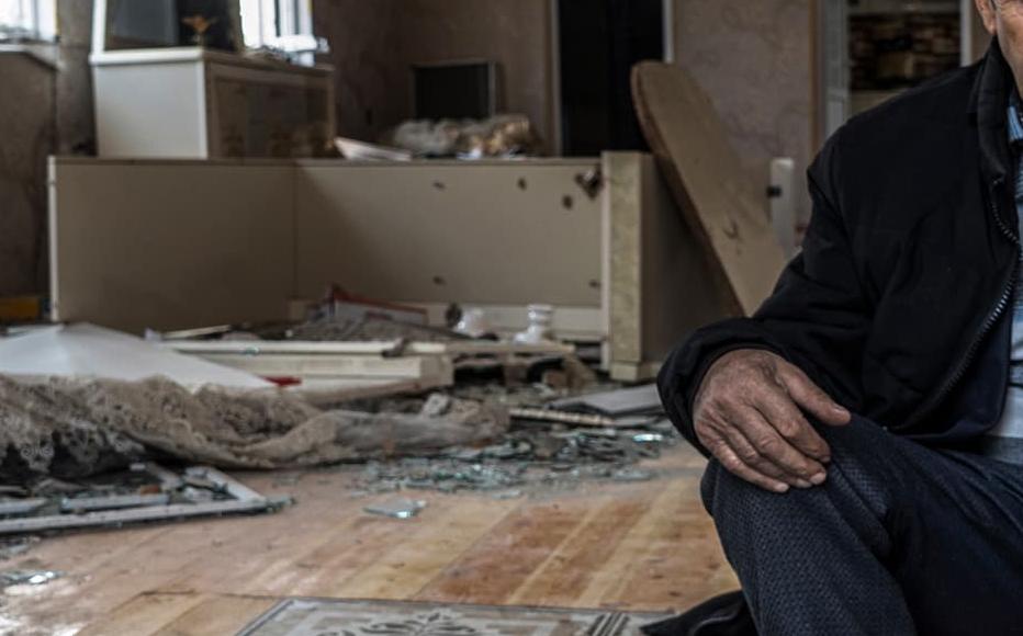 Etibar Huseynov, 58, sits in his house, which was hit by heavy artillery shelling during the war. He and his wife have been forced to live in a small room of the house, the only one that is still more or less intact, as they wait for the government to repair the house. Etibar Huseynov, 58, sits in his house, which was hit by heavy artillery shelling during the war. He and his wife have been forced to live in a small room of the house, the only one that is still more or less intact, as they wait for the government to repair the house.
