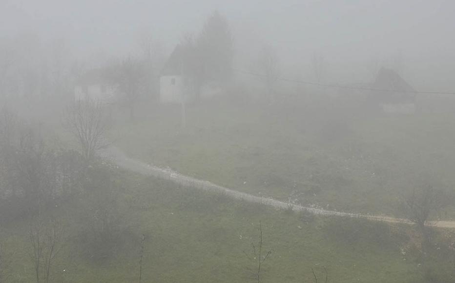 Mist envelops the road to Ledici.