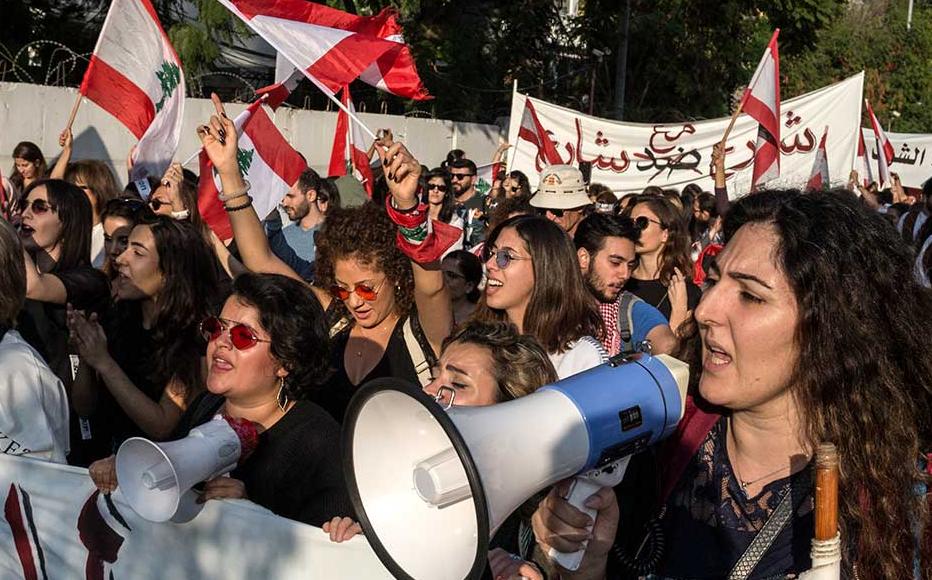 Demonstrators protesting for women's rights and against government corruption march through Beirut, Lebanon on November 3, 2019.