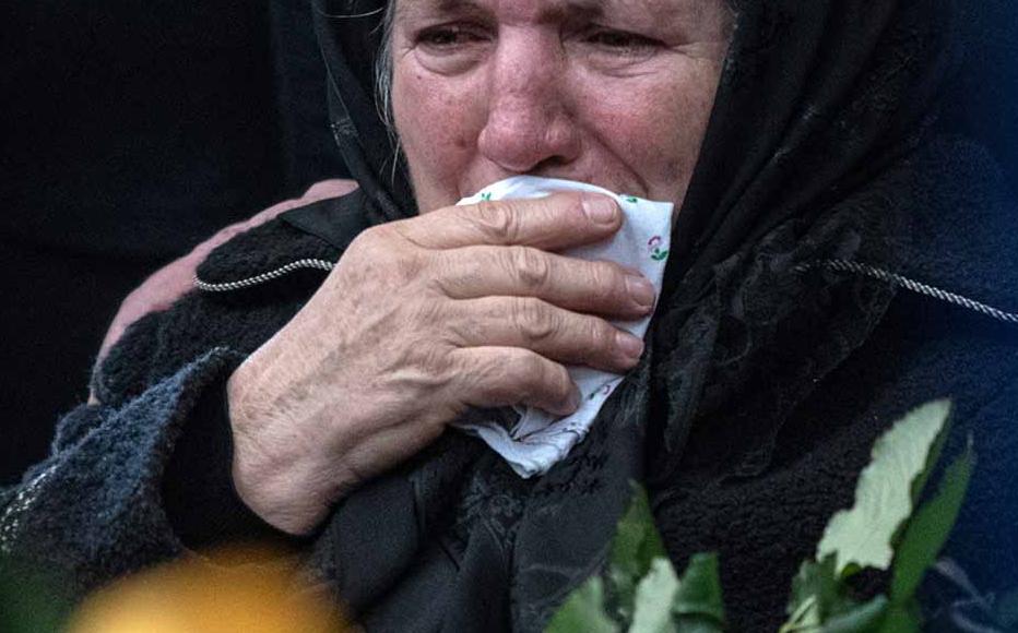 Mother of Ukrainian officer Ivan Skrypnyk cries during the funeral ceremony for her son on March 17, 2022 in Lviv, Ukraine. The soldier died in Sunday's airstrike on the nearby International Center for Peacekeeping and Security at the Yavoriv military complex.