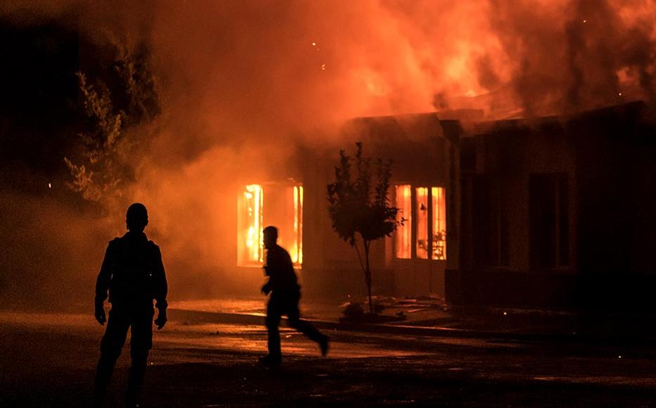 A fire burns in a hardware store after a rocket attack caused the building to catch fire on October 3, 2020 in Stepanakert, Nagorno-Karabakh.