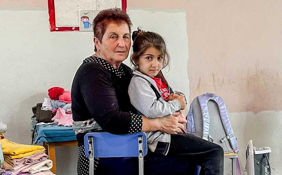 Madlena Ghahiryan with two of her nine grandchildren. “The journey from our homeland was harrowing. We had no food, not even bread… We found wood along the way, lit a fire and managed to roast some potatoes.” Madlena Ghahiryan with two of her nine grandchildren. “The journey from our homeland was harrowing. We had no food, not even bread… We found wood along the way, lit a fire and managed to roast some potatoes.”