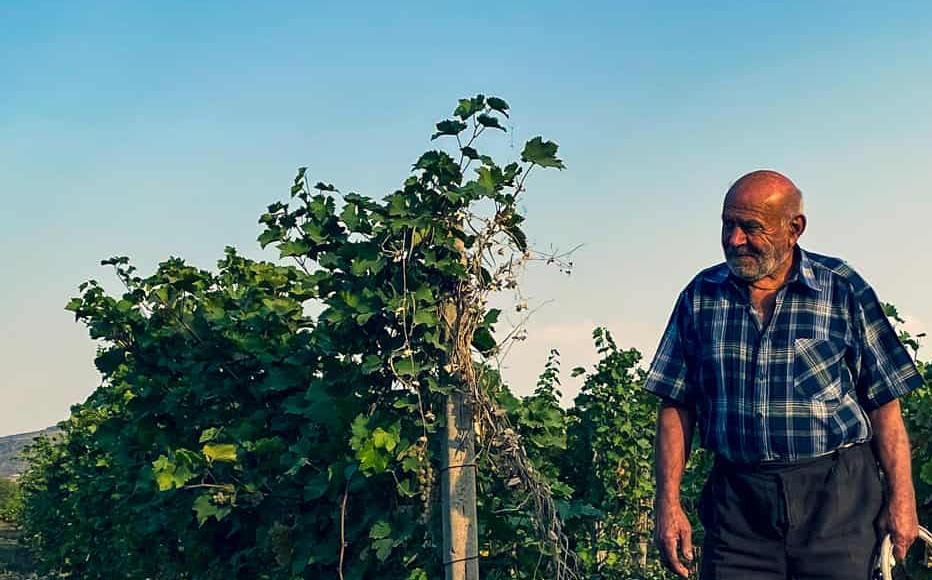 Heno, 76, helps his neighbours during the harvest. During the first Karabakh war, a Grad rocket exploded in his house, killing his wife Sharmagh and leaving him to raise their six children alone.