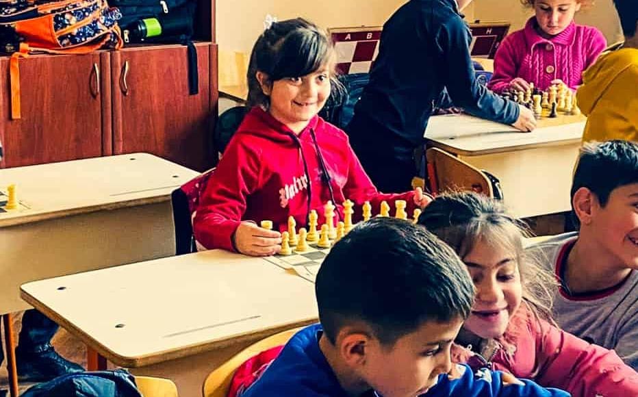 In Sos, Anush is with pupils who have just finished a class with their chess teacher, Margo. Chess is a mandatory subject in second, third and fourth grade. In Sos, Anush is with pupils who have just finished a class with their chess teacher, Margo. Chess is a mandatory subject in second, third and fourth grade.