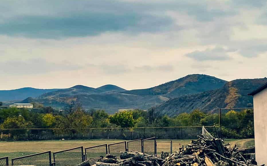 Winters are cold in the highlands in Sos and Machkalashen. In the school yard wood is being collected to be used as firewood during the winter season.