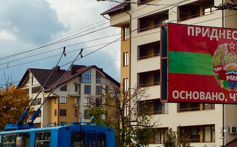 A billboard reads Transnistria is Founded to Live on the flag of the breakaway republic, the only one in the world that still bears the hammer and sickle insignia. The banner marks the 30th anniversary of the de facto authorities’ declaration of independence, on September 2, 1990.