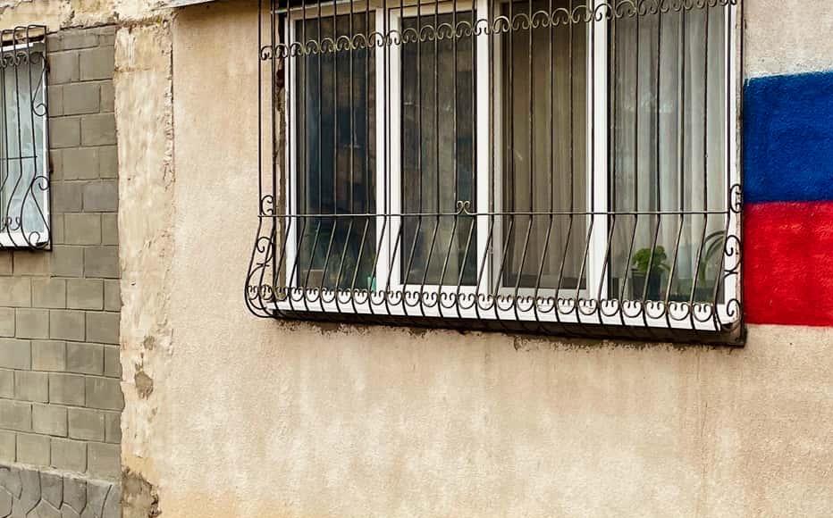 A Russian flag painted on an apartment block in a residential area. Ties with Russia are profound, and Russians are about 29 per cent of the region’s 473,000 residents, making them the largest group.