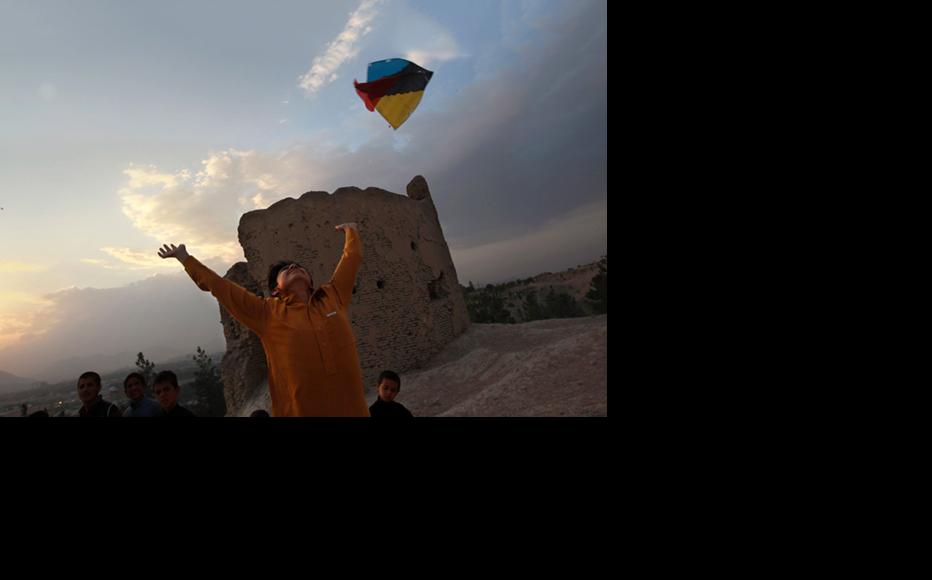 A boy flies a kite in Kabul. (Photo: John Moore/Getty Images)