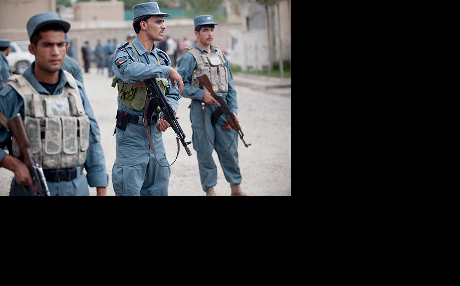 Police gather at the scene of an attack in Kabul. (Photo: Majid Saeedi/Getty Images)