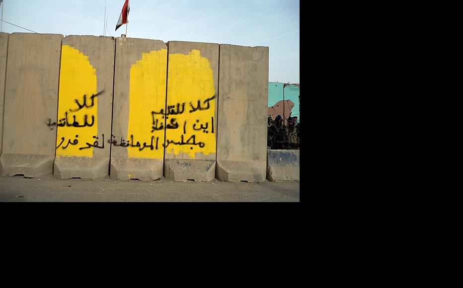 Graffiti saying "No sectarianism"on an anti-blast wall in Baquba, Diyala province, April 2012. (Photo: IWPR)