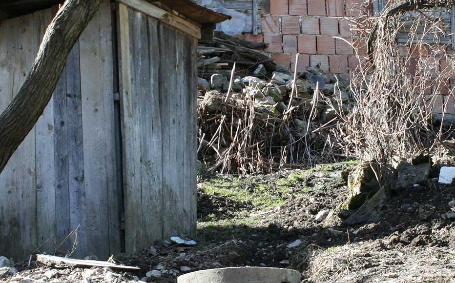 A wooden shack in which one Bosniak villager hid in October 1993, managing to survive.