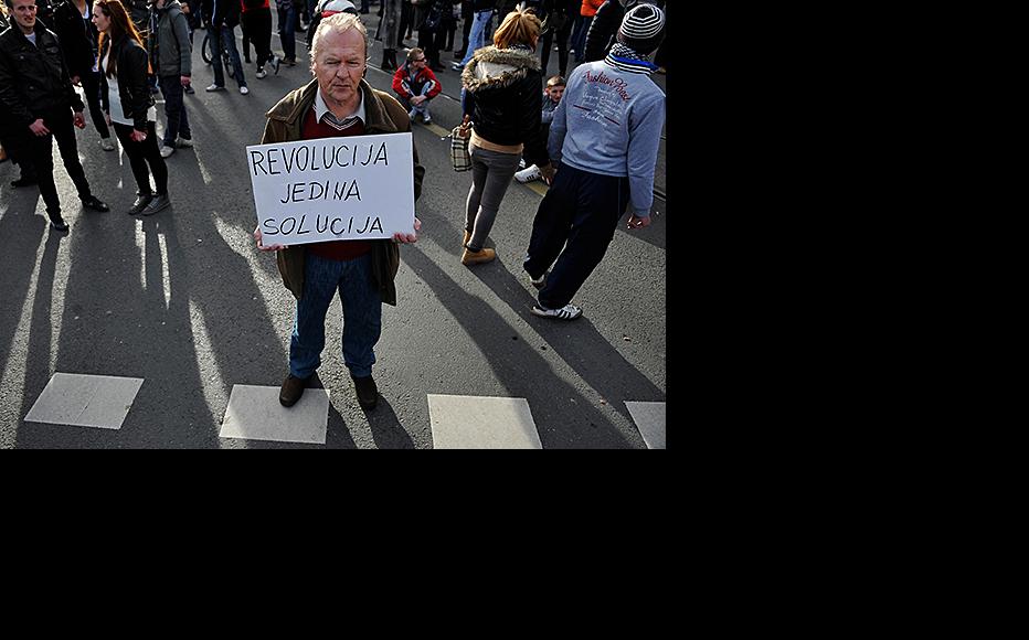 Protest outside Bosnian state presidency, Sarajevo, February 17. The banner reads "Revolution is the only solution". (Photo: Midhat Poturovic)