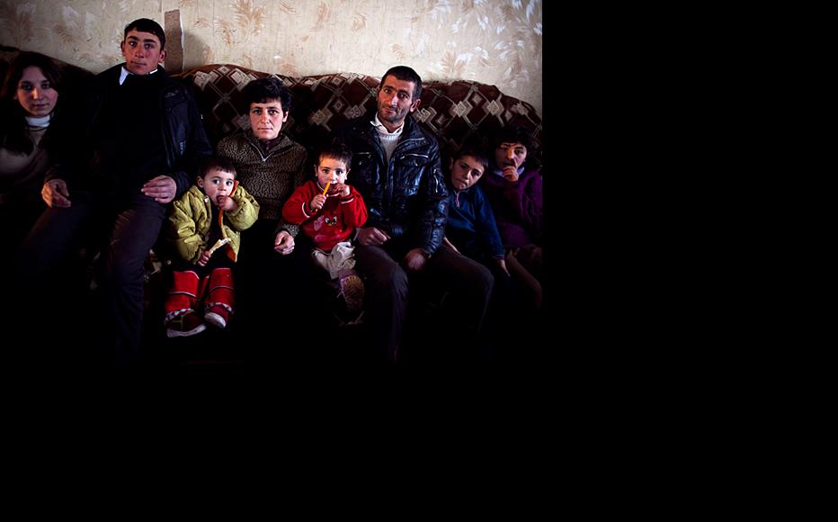 Silva Barkhoyan with her husband and six children. Her four-year-old has a lung condition but the family has no money for treatment. Her 14-year-old daughter had to leave school as she was unable to get there. (Photo: Inna Mkhitaryan)