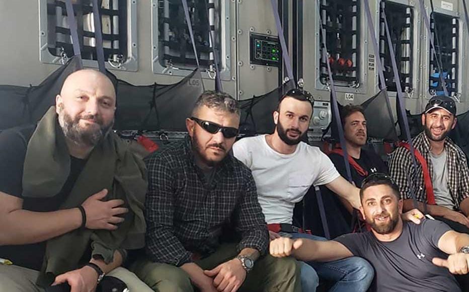 Levan Jangriashvili (in sunglasses), who worked in Afghanistan for many years, on his evacuation flight out of the country after the Taliban takeover Levan Jangriashvili (in sunglasses), who worked in Afghanistan for many years, on his evacuation flight out of the country after the Taliban takeover