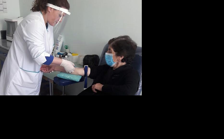 Nino Tvauri at the clinic where she works in Nikozi. (Photo: IWPR)