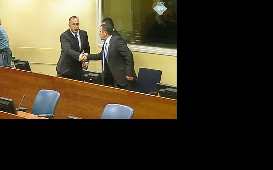 Ramush Haradinaj (left), Idriz Balaj and Lahi Brahimaj in the ICTY courtroom moments after being acquitted. (Photo: ICTY)