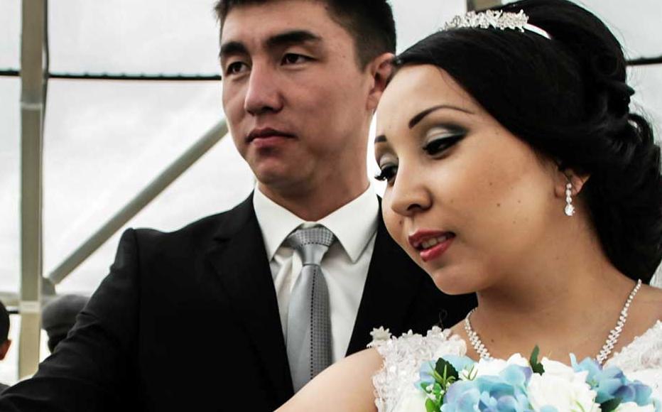 A Kazak bride and groom celebrate in Astana.