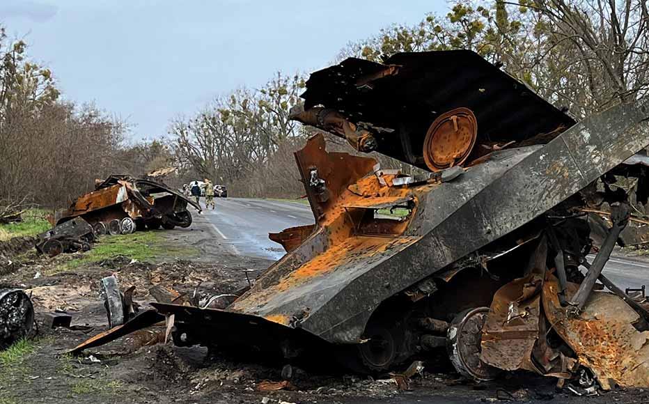 Destroyed military equipment scattered across the road on the drive from Kyiv.