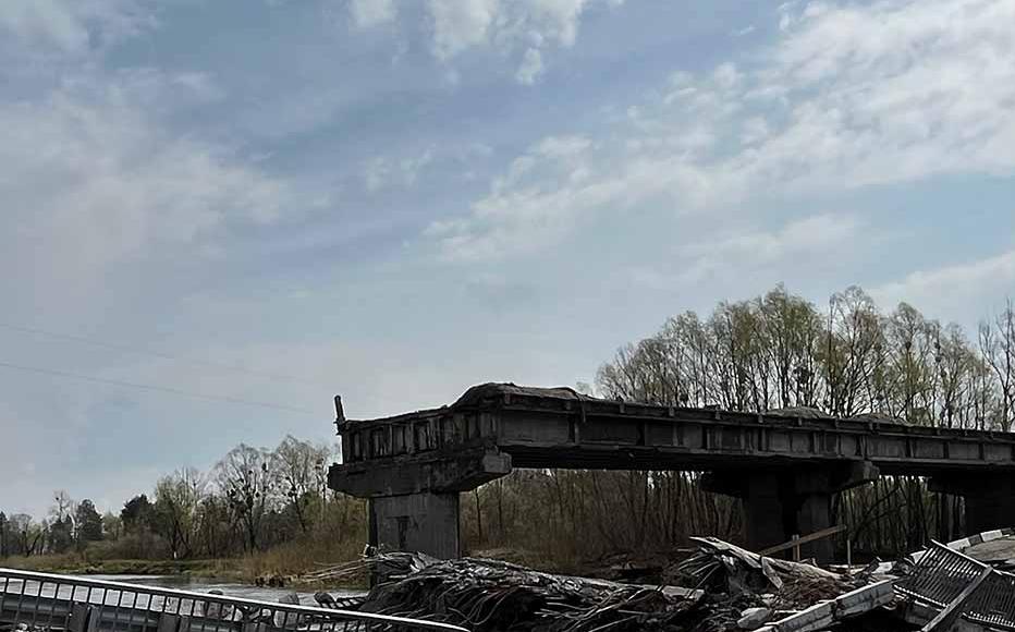 The wreckage of a bridge en route to the Polis’kyi region.