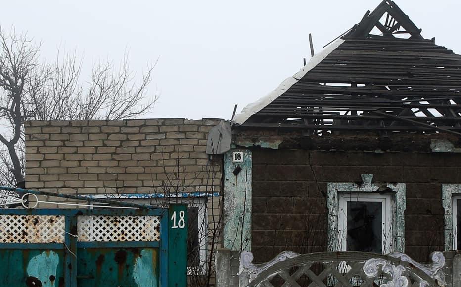 Private houses, deeply damaged by shelling, in the outskirts of Avdiivka. The area between Avdiivka and the neighbouring Yasynuvata, under separatist control, remains one of the hotspots of the conflict. (February 3, 2022)