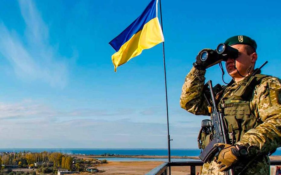 A Ukrainian border guard stands at the post in this undated photo.