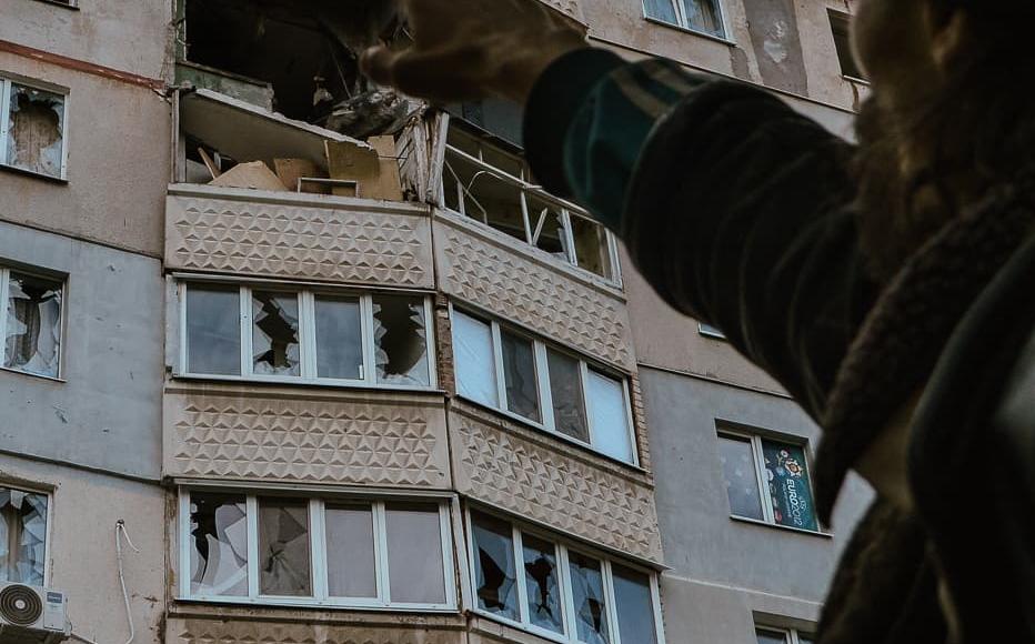 Mykhail indicates what remains of his apartment after a day of shelling. His block still stands, but little more than ash remains of many flats. (May 2022) Mykhail indicates what remains of his apartment after a day of shelling. His block still stands, but little more than ash remains of many flats. (May 2022)