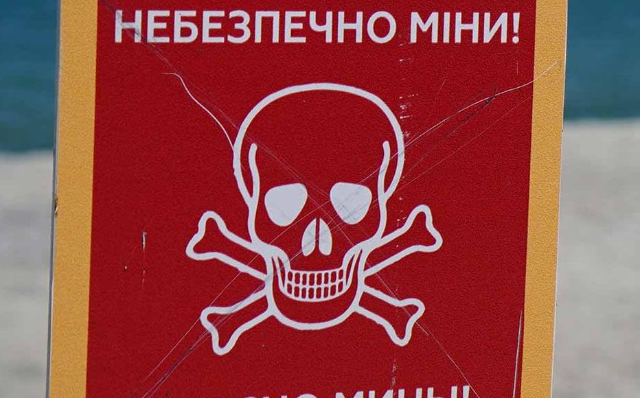 A sign warns against the danger of mines in the Black Sea. Russian forces have laid mines in the sea, while some parts of the seashore in Odesa were mined by Ukraine's Armed Forces to prevent Russian landing.