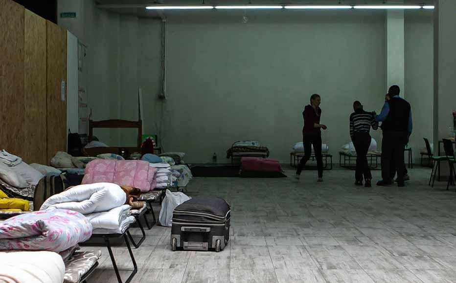 Sport centres, warehouses, shops and theatres have been transformed into shelters to accommodate Ukrainians fleeing across the country. Aid organisations and city authorities coordinate accommodation, medical assistance, warm meals and aid items.