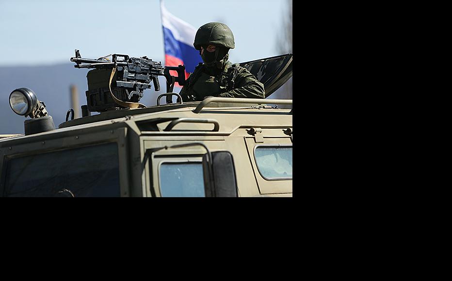 Russian military outside a Ukrainian base near Simferopol, March 11, 2014 . (Photo: Spencer Platt/Getty Images)