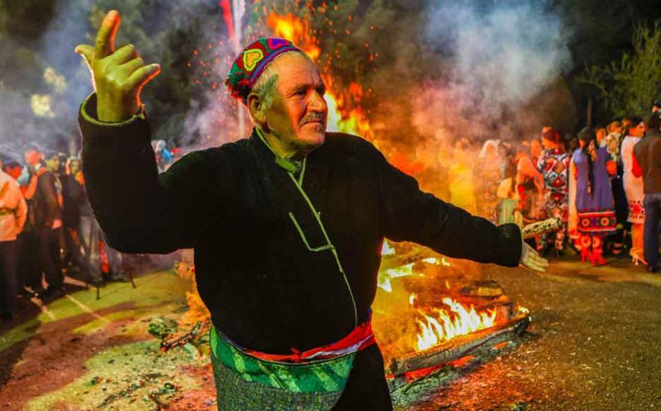  A man dances near the Navruz bonfire, in central Dushanbe.