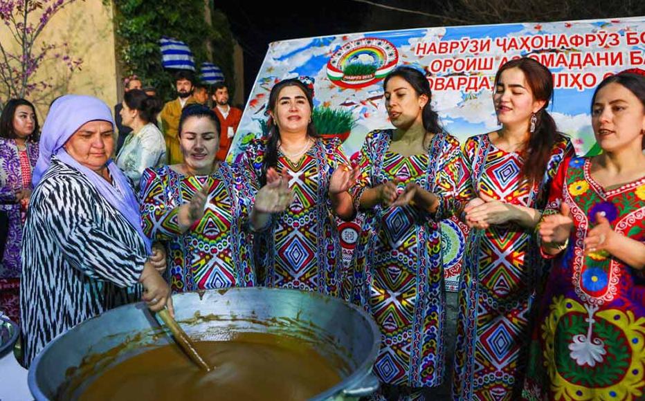 Women stirring large quantities of sumalak in Dushanbe. One legend about the dish involves a farmer, who moistened wheat grains as he prepared to sow. The grains sprouted, so he asked his wife to cook them so they would not go to waste. After a long boil, the dish turned into the sweet paste still eaten today.