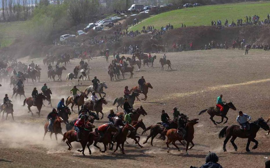A buzkashi competition in a field in Vahdat, a suburb of Dushanbe. In Tajikistan’s traditional equestrian sport, common also in Afghanistan, men on horseback take the carcass of a dead goat from each other and throw it into a goal. A buzkashi competition in a field in Vahdat, a suburb of Dushanbe. In Tajikistan’s traditional equestrian sport, common also in Afghanistan, men on horseback take the carcass of a dead goat from each other and throw it into a goal.