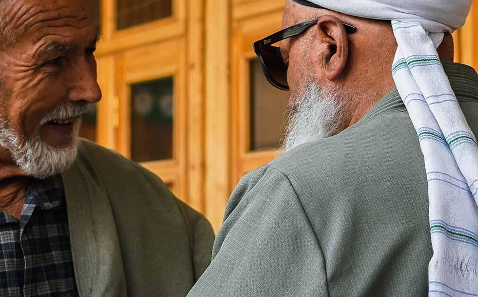 Village elders outside the mosque. Usto Toichi (left) is Gelon’s well-known carpenter and knife maker.