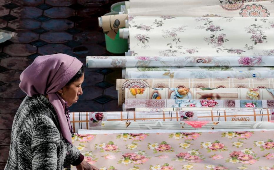 Nasiba sells oilcloth in a homeware shop in Chorsu.