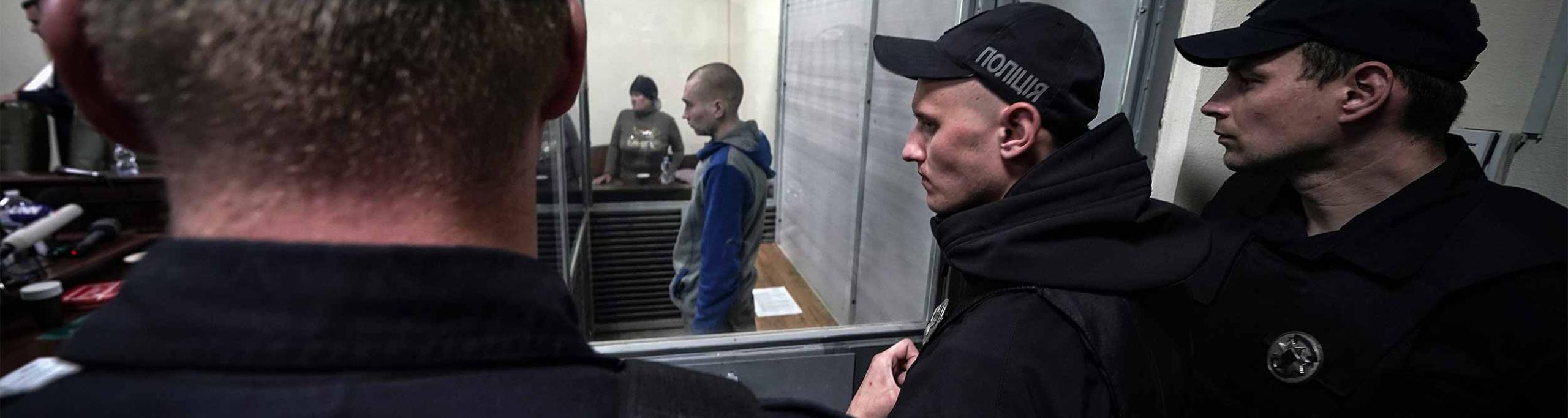 Captured Russian soldier, Sgt. Vadim Shishimarin, 21, attends a court hearing on May 18, 2022 in Kyiv, Ukraine. Sgt. Shishimarin pleaded guilty to shooting a civilian on a bicycle in the village of Chupakhivka, Sumy Region, days after Russia's invasion of Ukraine on Feb. 24.