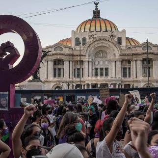 Protesters hold banners and chant slogans during a demonstration as part of the International Women's Day on March 8, 2022 in Mexico City, Mexico.