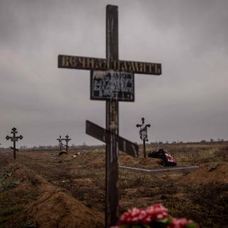 The graves of more than twenty men that were reportedly killed by Russian forces are seen at the Kherson city ceremony on November 20, 2022 in Kherson, Ukraine.