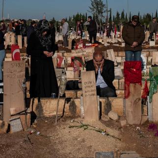 Relatives of the earthquake victims visit and pray at the graves of their loved ones on the first day of Eid al-Fitr on April 21, 2023 in Adiyaman, Turkey.