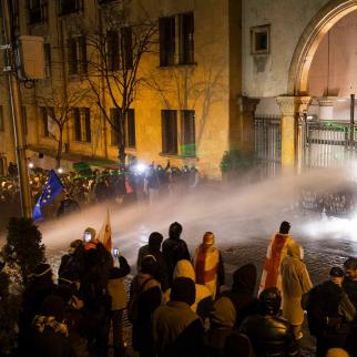 Demonstrators clash with police officers during a protest outside the parliament on November 29, 2024 in Tbilisi, Georgia.