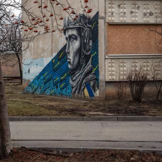 A mural of a Ukrainian serviceman is pictured on the side of an apartment block in Kharkiv's Saltivka district on January 20, 2025 in Kharkiv, Ukraine.