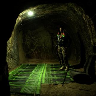 A soldier with the Afghan National Army stands inside a room which was previously part of a jail used by the Islamic State of Iraq and Syria in the Achin District, Afghanistan. (Photo: Andrew Renneisen/Getty Images)