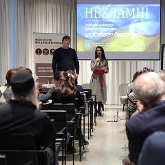 Olha Volynska, the director of the documentary film Unbroken and Dmitry Reva, Director of Sich, an NGO providing legal assistance to former prisoners introducing the film and some key themes of the discussion. (Photo: IWPR)