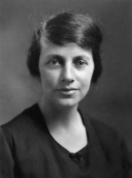 A black and white photo of a woman